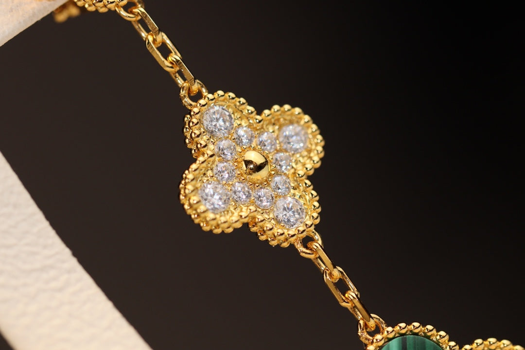 [NOVO] Kleeblatt-Ohrringe aus Gold, Malachit und Diamanten mit 3 Motiven