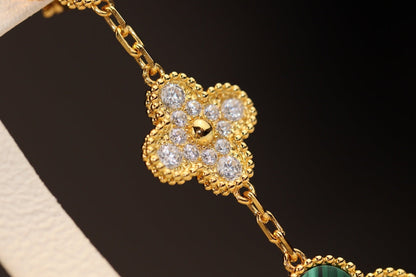 [NOVO] Kleeblatt-Ohrringe aus Gold, Malachit und Diamanten mit 3 Motiven