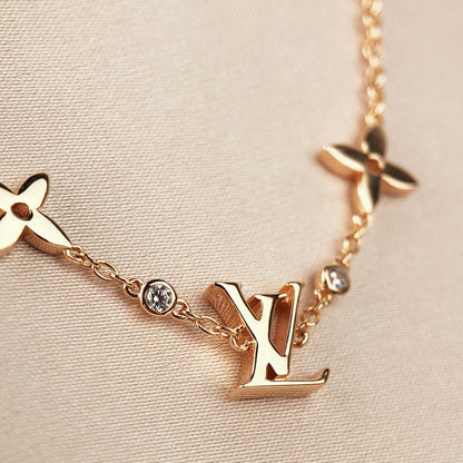 [NOVO]Stern- und Sonnenarmband mit 7 Motiven, Gold