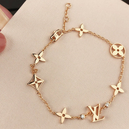 [NOVO]Stern- und Sonnenarmband mit 7 Motiven, Gold
