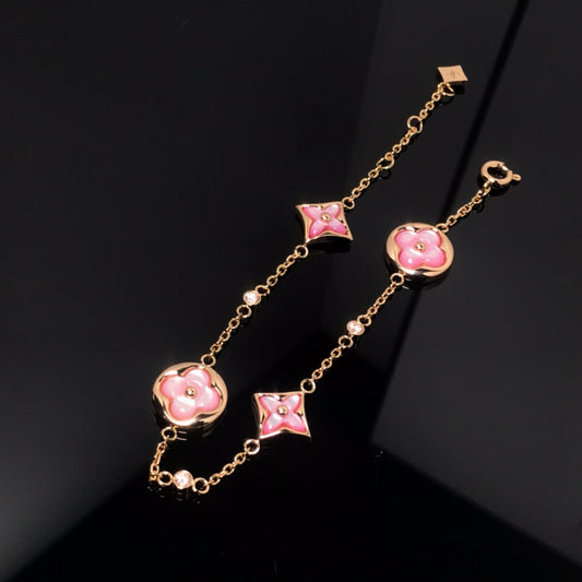 [NOVO]Stern- und Sonnenarmband mit 4 Motiven, rosa Mopp, rosa-goldenes Armband 