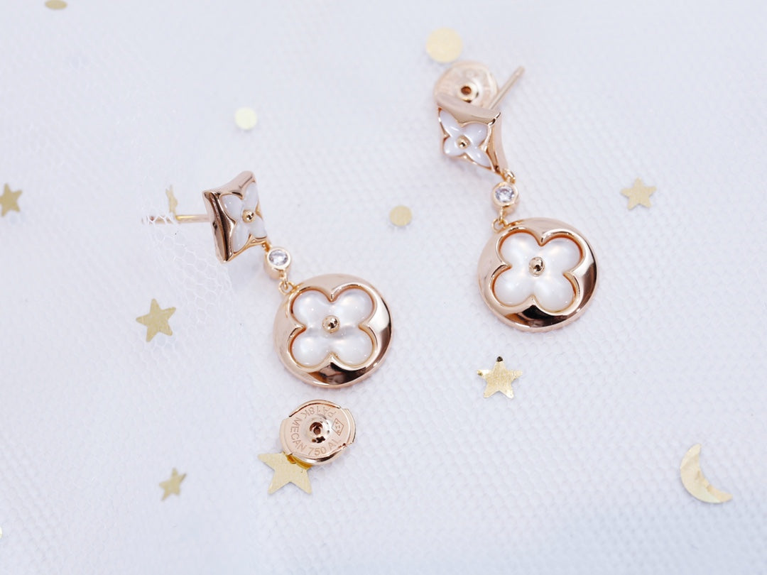 [NOVO]Ohrringe mit Stern und Sonne in Rosa-Gold