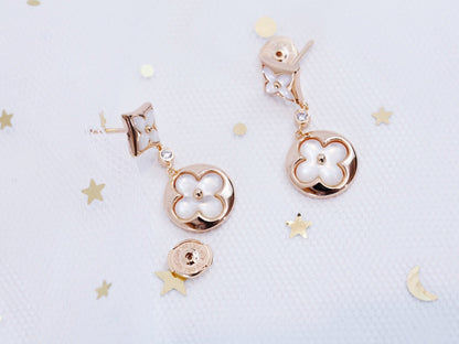 [NOVO]Ohrringe mit Stern und Sonne in Rosa-Gold