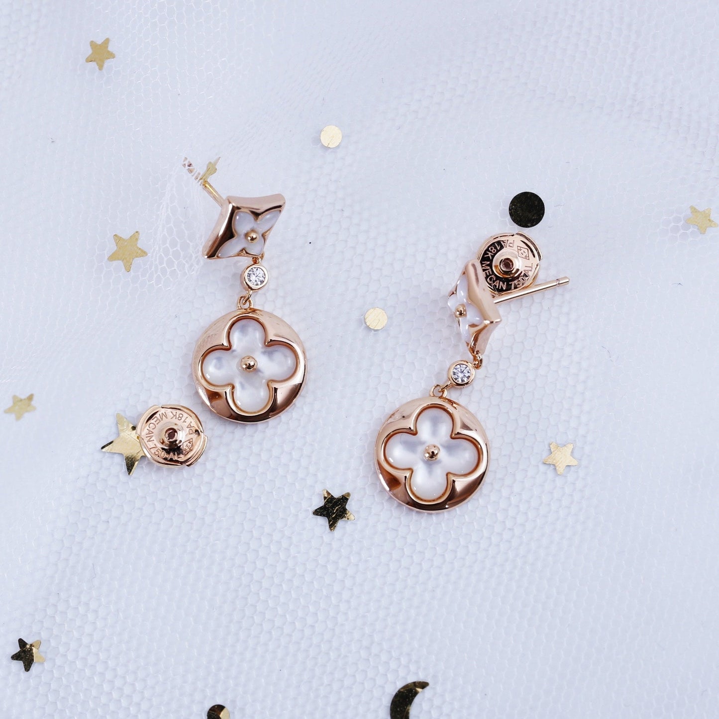 [NOVO]Ohrringe mit Stern und Sonne in Rosa-Gold