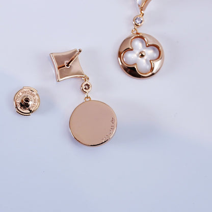 [NOVO]Ohrringe mit Stern und Sonne in Rosa-Gold