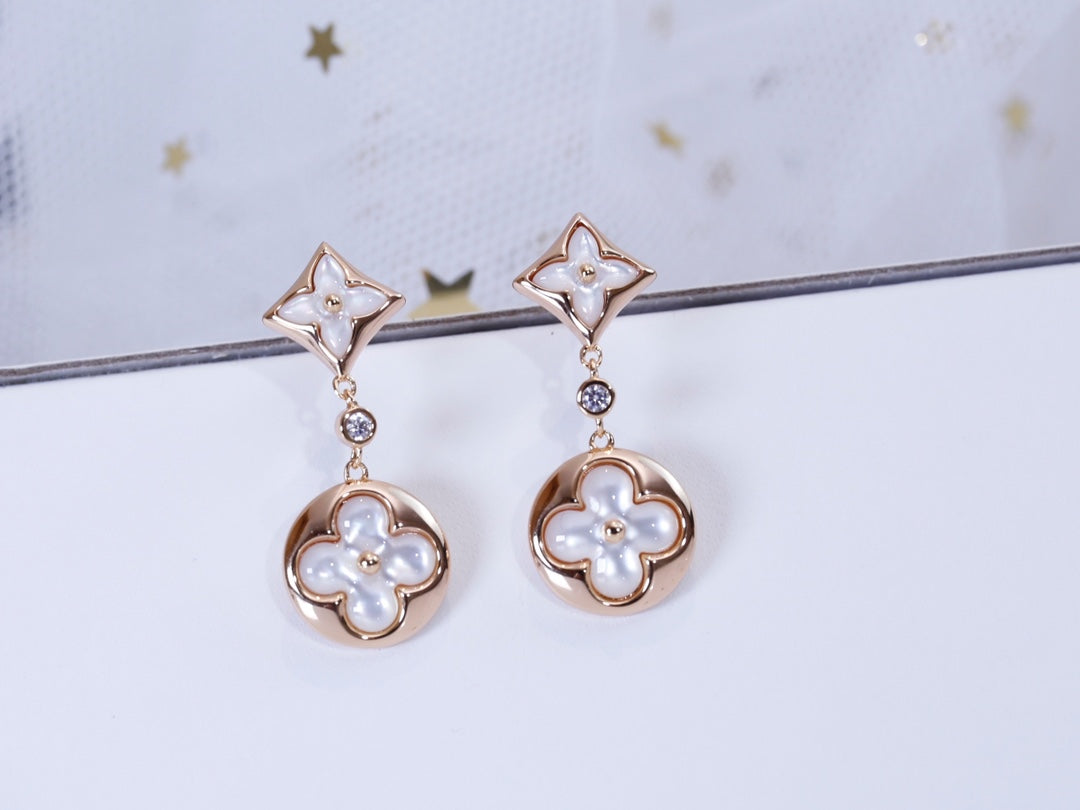 [NOVO]Ohrringe mit Stern und Sonne in Rosa-Gold