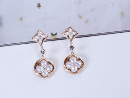[NOVO]Ohrringe mit Stern und Sonne in Rosa-Gold