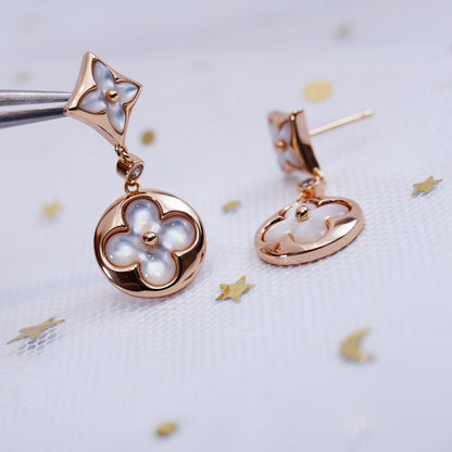[NOVO]Ohrringe mit Stern und Sonne in Rosa-Gold