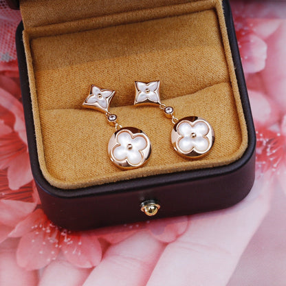 [NOVO]Ohrringe mit Stern und Sonne in Rosa-Gold