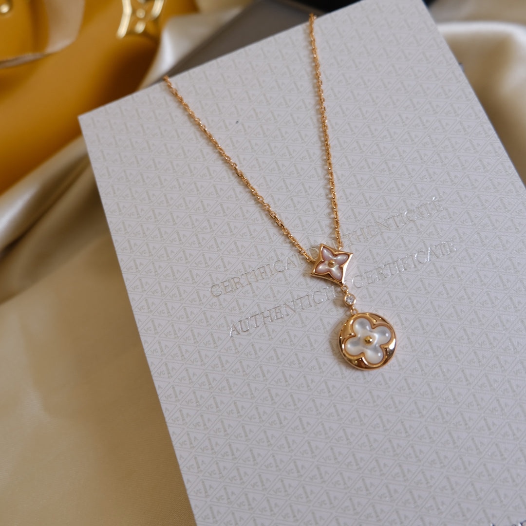 [NOVO] Halskette mit Stern und Sonne, weißes Perlmuttmotiv, 2-teilig, rosa-golden 
