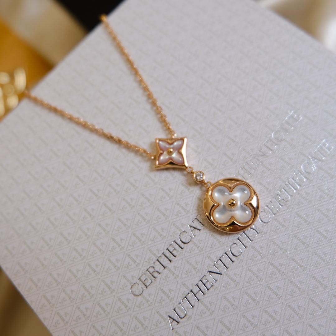 [NOVO] Halskette mit Stern und Sonne, weißes Perlmuttmotiv, 2-teilig, rosa-golden 