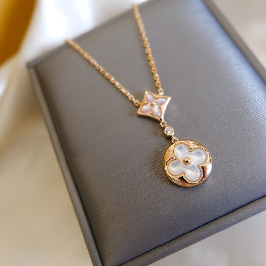[NOVO] Halskette mit Stern und Sonne, weißes Perlmuttmotiv, 2-teilig, rosa-golden 