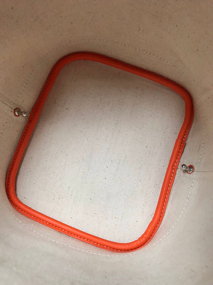 PETIT FLOT BUCKET BAG 22 IN ORANGE GOYARDINE CANVAS AND LAMBSKIN TRIM