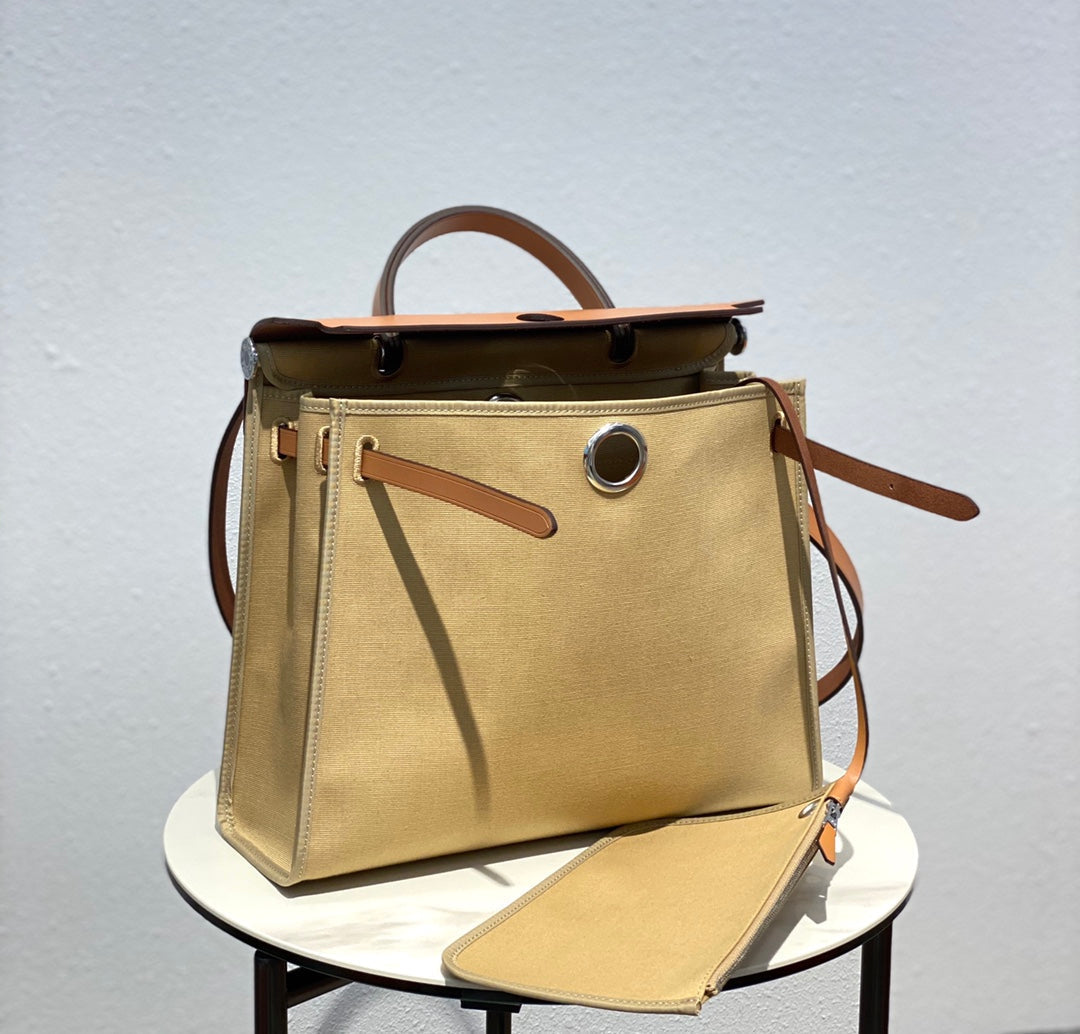 Herbag 31 Toile Beige Canvas Gold Cowhide Leather