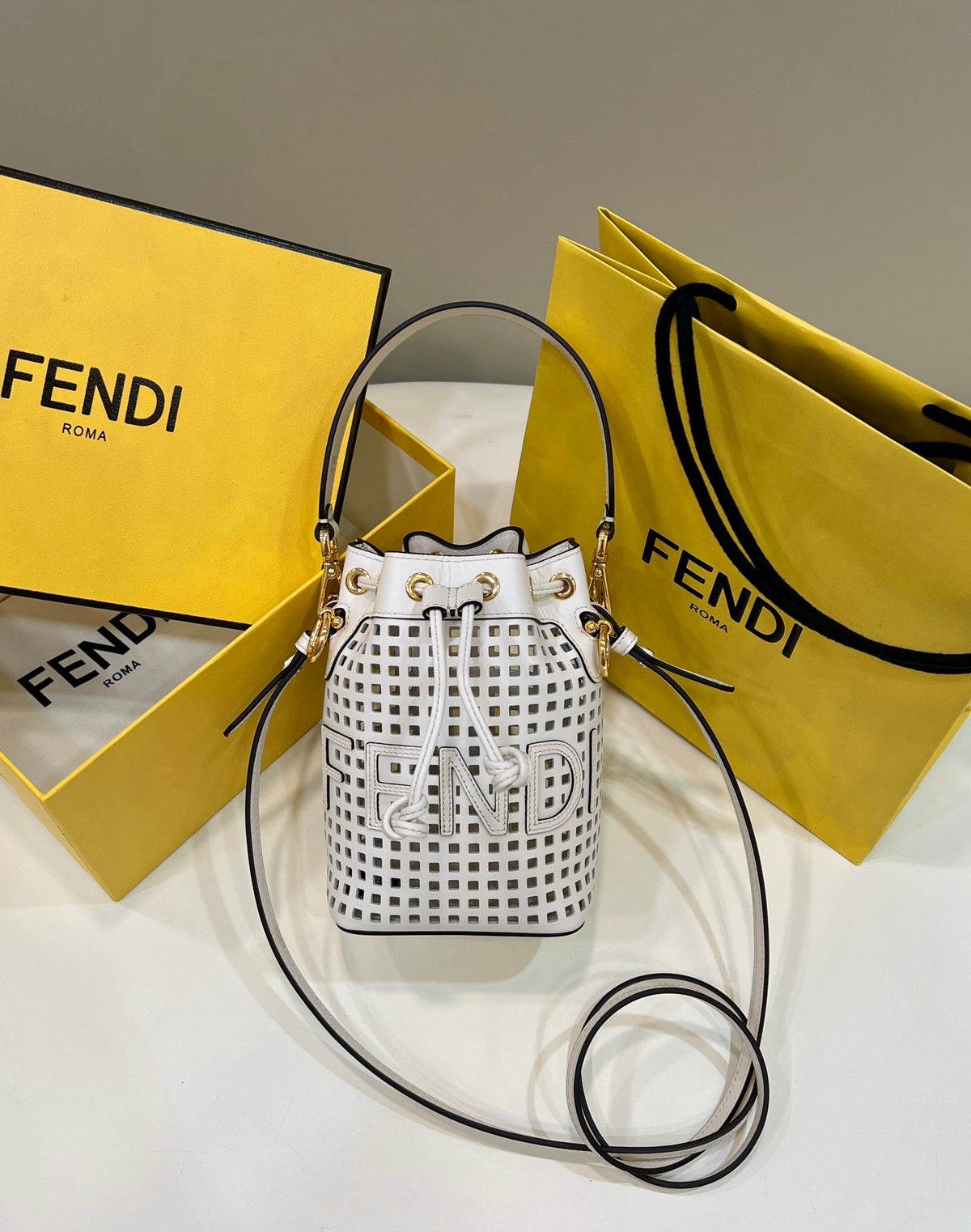 MON TRESOR 19 IN WHITE PERFORATED CALFSKIN