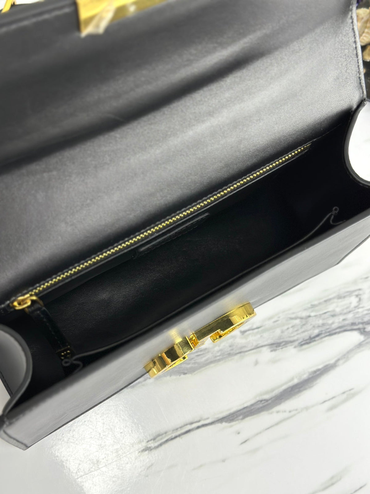 MONTAIGNE 25 BAG IN BLACK CALFSKIN