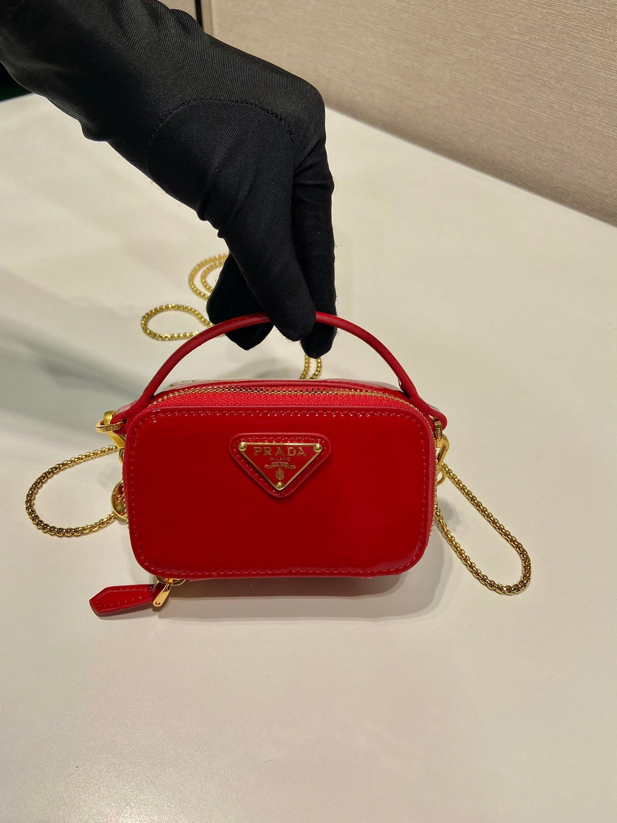 MINI HAND BAG 11 WITH GOLD STRAP IN RED PATENT CALFSKIN