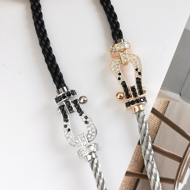 [NOVO]FORCE Großes Hufeisen Schwarz Weiß Diamantarmband Roségold