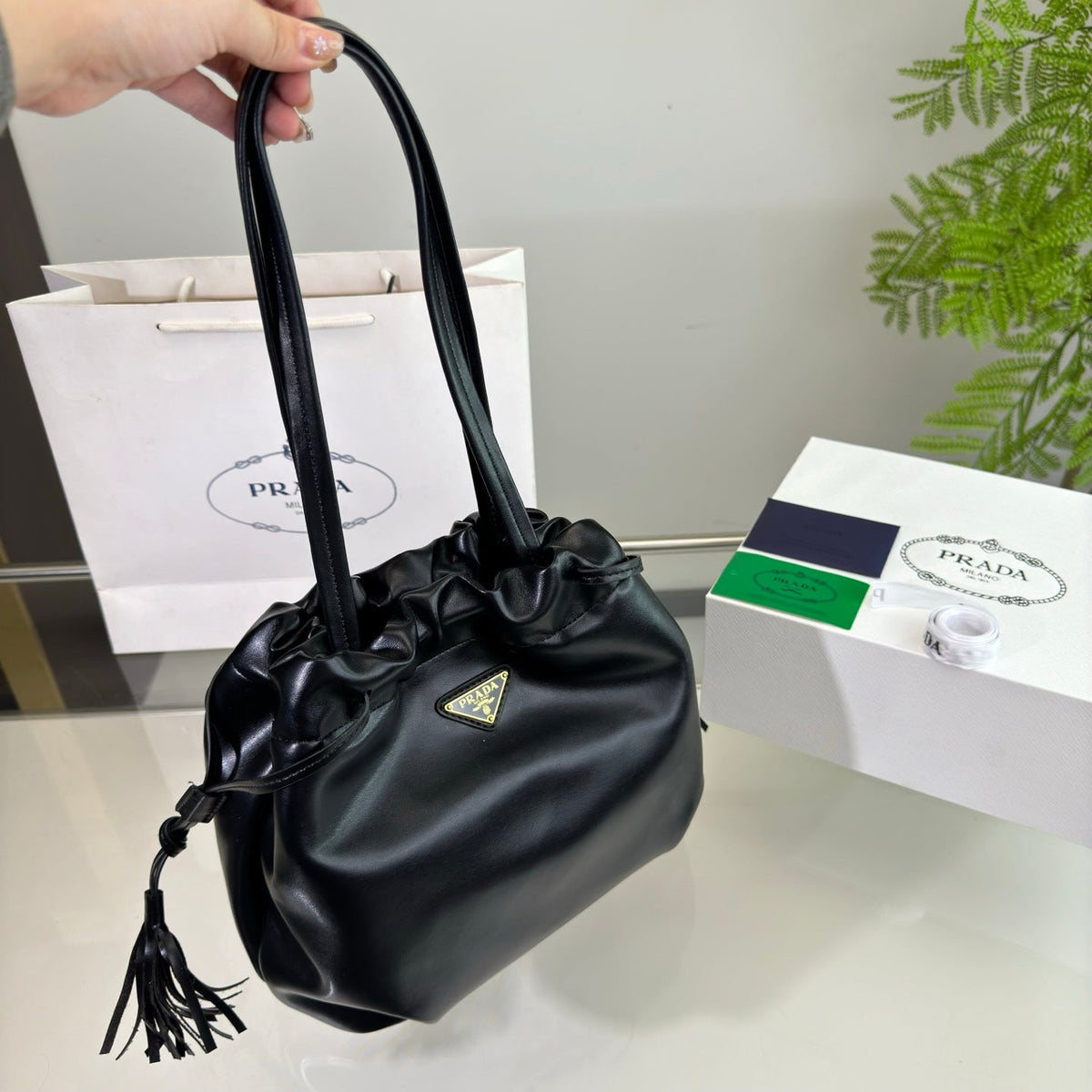 DRAWSTRING BUCKET BAG 25 IN BLACK SOFT LAMBSKIN