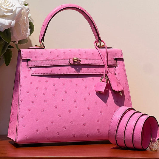 KELLY SELLIER 25 BAG IN DOLL PINK OSTRICH LEATHER WITH GOLD HARDWARE (MADE - TO - ODER)