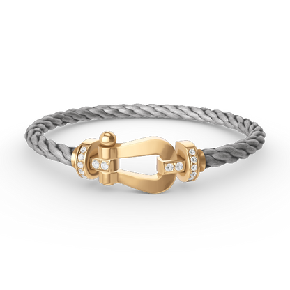 [NOVO]FORCE Großes Hufeisen-Armband mit Halbdiamanten, Gold